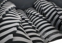 四轴破碎机在处理危险废物桶中的效果