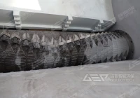 单轴撕碎机在处理塑料机头料应用中的优势